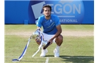 EASTBOURNE, ENGLAND - JUNE 21:  Feliciano Lopez of Spain celebrates with the trophy after beating Richard Gasquet of France during their Men's Singles Finals match on day eight of the Aegon International at Devonshire Park on June 21, 2014 in Eastbourne, England. (Photo by Jan Kruger/Getty Images)